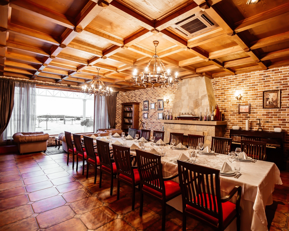 A TopLine series fan coil unit efficiently cooling and heating a dining room for comfort.