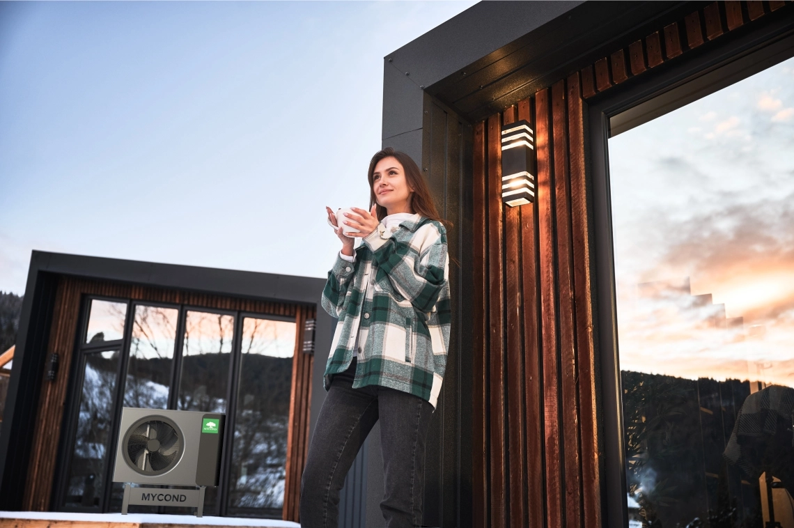 Woman enjoying winter holidays on a terrace.
