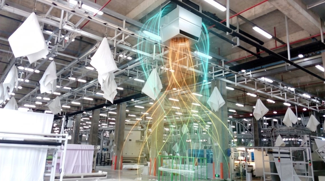 Mycond OXA unit in a weaving mill: heated and humidified air above the looms
